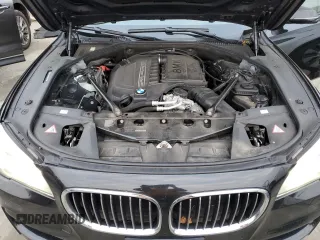 2014 BMW 7 Series 740Li xDrive with VIN WBAYF4C59ED281776, listed as a Copart auction lot 83563234 with 77,899 mi miles and Salvage Title. Bid and sale history available at carsss.com. Image 11.