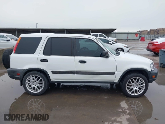 2001 Honda CR-V LX with VIN JHLRD28431S006396, listed as a IAAI auction lot 41968207 with 230,018 mi miles. Bid and sale history available at carsss.com. Image 13.