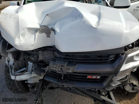 2018 Chevrolet Colorado 4WD Z71 with VIN 1GCPTDE18J1100261, listed as a Copart auction lot 51179945 with 21,580 mi miles and Salvage Title. Bid and sale history available at carsss.com. Image 11.