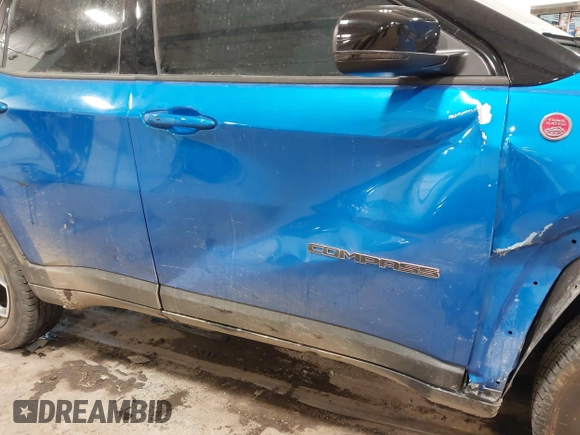 2022 Jeep Compass Trailhawk with VIN 3C4NJDDB1NT236477, listed as a IAAI auction lot 41485656 with 7,341 mi miles and . Bid and sale history available at DreamBid. Image 17.