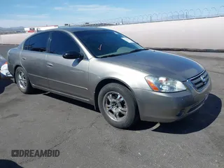 2003 Nissan Altima S z VIN 1N4AL11D23C211941, wystawiony jako IAAI lot #42224529 z przebiegiem 138 593 mil mil oraz . Historia ofert i sprzedaży dostępna na DreamBid. Obrazek 1.