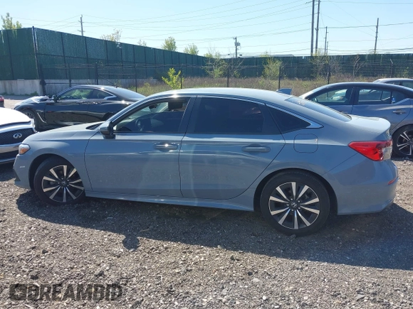 2024 Honda Civic EX z VIN 2HGFE1F74RH319661, wystawiony jako IAAI lot #42066326 z przebiegiem 34 629 mil mil oraz . Historia ofert i sprzedaży dostępna na DreamBid. Obrazek 14.