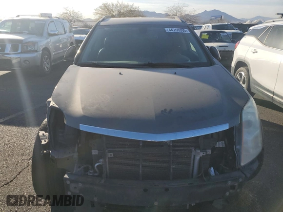 2014 Cadillac SRX z VIN 3GYFNAE34ES561414, wystawiony jako Copart lot #44760395 z przebiegiem 131 723 mil mil oraz Szkoda całkowita • Salvage title. Historia ofert i sprzedaży dostępna na DreamBid. Obrazek 5.