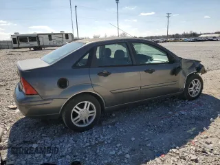 2004 Ford Focus SE with VIN 1FAFP34304W165468, listed as a Copart auction lot 45719985 with 208,259 mi miles and Salvage title. Bid and sale history available at DreamBid. Image 3.