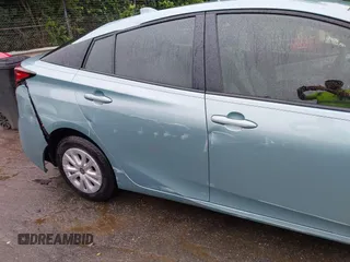 2022 Toyota Prius L Eco with VIN JTDKAMFU4N3158998, listed as a IAAI auction lot 42625041 with 43,033 mi miles and . Bid and sale history available at DreamBid. Image 18.