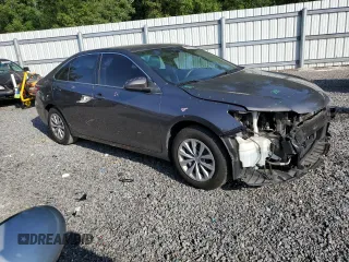 2015 Toyota Camry XLE with VIN 4T1BF1FKXFU899517, listed as a Copart auction lot 56001835 with 124,675 mi miles and Salvage Title. Bid and sale history available at DreamBid. Image 4.