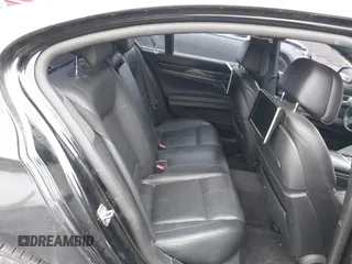 2015 BMW 7 Series 750i xDrive with VIN WBAYB6C59FD965820, listed as a IAAI auction lot 41558215 with 142,617 mi miles. Bid and sale history available at carsss.com. Image 8.