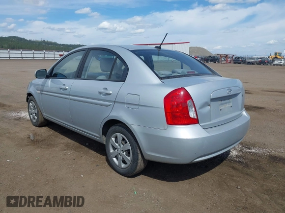 2010 Hyundai Accent GLS with VIN KMHCN4AC1AU476326, listed as a IAAI auction lot 42141297 with 203,607 mi miles. Bid and sale history available at carsss.com. Image 3.