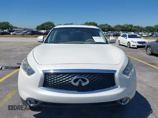 2017 Infiniti QX70 z VIN JN8CS1MU4HM142385, wystawiony jako IAAI lot #41774588 z przebiegiem 80 015 mil mil oraz . Historia ofert i sprzedaży dostępna na DreamBid. Obrazek 13.