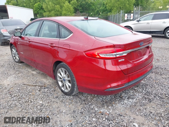 2017 Ford Fusion Hybrid SE with VIN 3FA6P0LU1HR238283, listed as a IAAI auction lot 42233496 with 123,452 mi miles and . Bid and sale history available at DreamBid. Image 3.