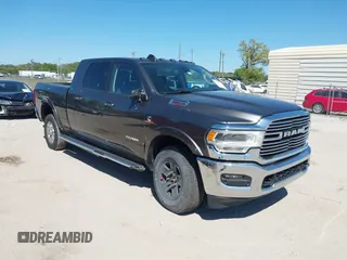 2020 Ram 2500 Laramie z VIN 3C6UR5NL9LG206707, wystawiony jako IAAI lot #41750125 z przebiegiem 96 734 mil mil oraz . Historia ofert i sprzedaży dostępna na DreamBid. Obrazek 1.
