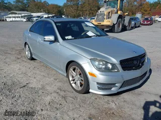 2014 Mercedes-Benz C-Class C 250 Sport with VIN WDDGF4HB8EA947921, listed as a IAAI auction lot 41109688 with 120,249 mi miles. Bid and sale history available at carsss.com. Image 1.