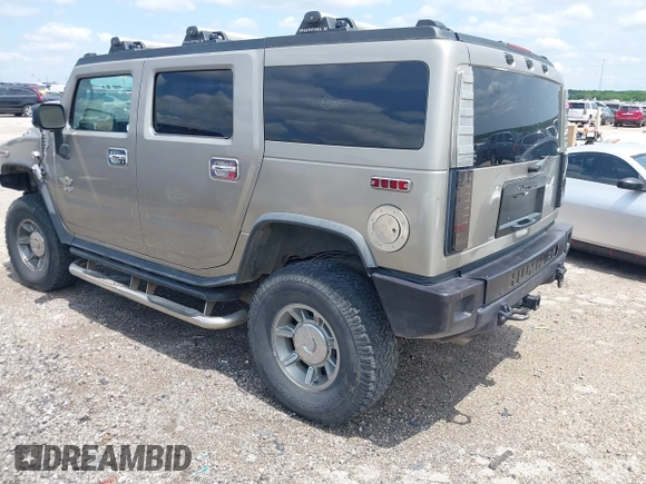 2003 Hummer H2 with VIN 5GRGN23U23H148326, listed as a IAAI auction lot 42068326 with 149,396 mi miles. Bid and sale history available at carsss.com. Image 3.
