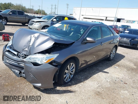 2015 Toyota Camry XLE with VIN 4T1BF1FK0FU952421, listed as a IAAI auction lot 41714622 with 125,553 mi miles and . Bid and sale history available at DreamBid. Image 2.