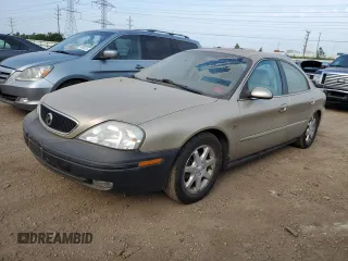 2000 Mercury Sable LS Premium with VIN 1MEFM55S6YA635332, listed as a Copart auction lot 59257115 with 63,172 mi miles and Salvage title. Bid and sale history available at DreamBid. Image 1.