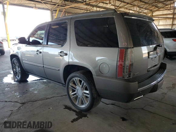 2012 Cadillac Escalade Premium z VIN 1GYS4CEF9CR225037, wystawiony jako Copart lot #50270415 z przebiegiem 172 483 mil mil oraz Szkody całkowita. Historia ofert i sprzedaży dostępna na DreamBid. Obrazek 2.