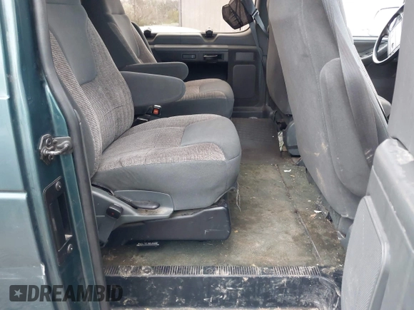 1996 Ford Econoline Cargo with VIN 1FMEE11H3THB23052, listed as a IAAI auction lot 41943008 with 161,522 mi miles and . Bid and sale history available at DreamBid. Image 8.