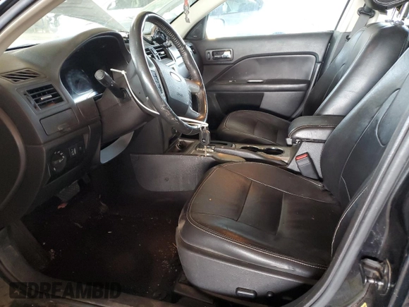 2012 Ford Fusion Hybrid с VIN 3FADP0L34CR416775, выставлен на аукционе Copart как лот 55108645 с пробегом 102 574 миль миль и Списание • Salvage title. История ставок и продаж доступна на DreamBid. Изображение 7.