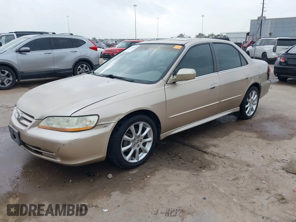 2001 Honda Accord EX z VIN 1HGCG165X1A077702, wystawiony jako IAAI lot #41770556 z przebiegiem 149 516 mil mil oraz . Historia ofert i sprzedaży dostępna na DreamBid. Obrazek 18.