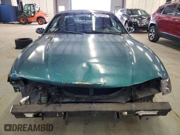 1996 Ford Mustang GT z VIN 1FALP42X5TF191769, wystawiony jako Copart lot #49364525 z przebiegiem 69 029 mil mil oraz Szkoda całkowita • Salvage title. Historia ofert i sprzedaży dostępna na DreamBid. Obrazek 5.