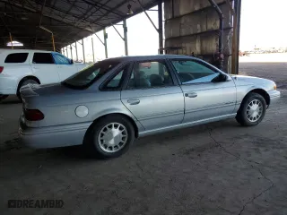 1995 Ford Taurus GL with VIN 1FALP524XSG154141, listed as a Copart auction lot 77271544 with 72,118 mi miles and Clean Title. Bid and sale history available at carsss.com. Image 3.