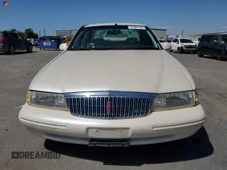 1995 Lincoln Continental z VIN 1LNLM97V3SY641554, wystawiony jako Copart lot #55001165 z przebiegiem 173 490 mil mil oraz Szkody całkowita. Historia ofert i sprzedaży dostępna na DreamBid. Obrazek 5.