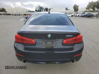 2018 BMW 5 Series 530i with VIN WBAJA5C51JWA38499, listed as a Copart auction lot 49150205 with 59,521 mi miles and Salvage Title. Bid and sale history available at DreamBid. Image 6.