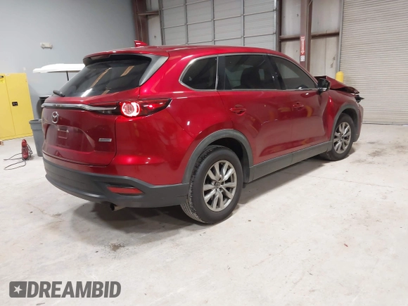 2019 Mazda CX-9 Touring with VIN JM3TCACY1K0331904, listed as a IAAI auction lot 42146945 with 77,699 mi miles and . Bid and sale history available at DreamBid. Image 4.