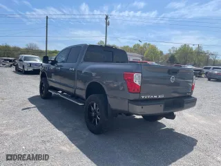 2016 Nissan Titan XD Platinum Reserve with VIN 1N6BA1F2XGN516798, listed as a Copart auction lot 53584635 with 104,737 mi miles and Clean Title. Bid and sale history available at carsss.com. Image 3.