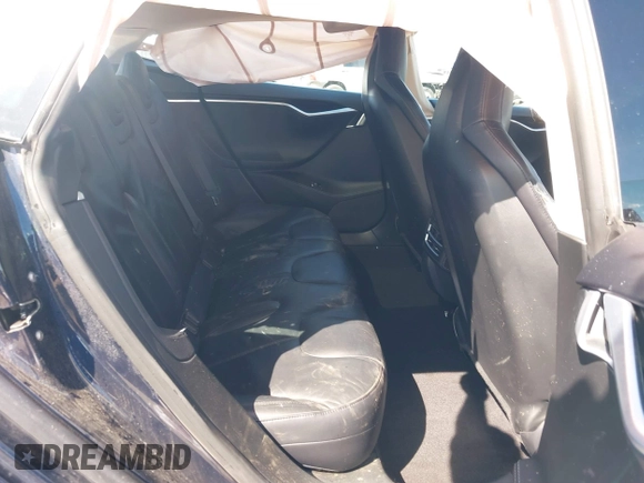 2014 Tesla Model S 60 with VIN 5YJSA1H11EFP47897, listed as a IAAI auction lot 41802285 with Not Provided miles and . Bid and sale history available at DreamBid. Image 8.