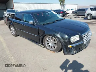 2008 Chrysler 300 C Hemi with VIN 2C3KA63H78H132890, listed as a IAAI auction lot 41579009 with 187,213 mi miles. Bid and sale history available at carsss.com. Image 1.