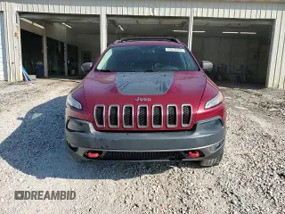 2015 Jeep Cherokee Trailhawk with VIN 1C4PJMBS1FW745928, listed as a Copart auction lot 62032585 with 132,559 mi miles and Salvage title. Bid and sale history available at DreamBid. Image 14.
