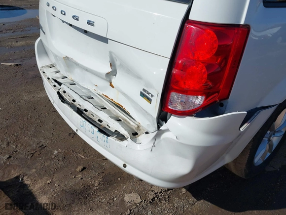 2016 Dodge Grand Caravan SXT with VIN 2C4RDGCG2GR390001, listed as a IAAI auction lot 41943622 with 127,328 mi miles. Bid and sale history available at carsss.com. Image 6.