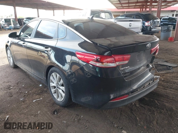 2018 Kia Optima LX with VIN 5XXGT4L39JG251635, listed as a IAAI auction lot 41933408 with 135,718 mi miles. Bid and sale history available at carsss.com. Image 3.