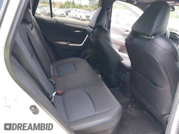 2021 Toyota RAV4 Hybrid XSE with VIN 4T3E6RFV9MU052563, listed as a IAAI auction lot 42295510 with 24,771 mi miles and . Bid and sale history available at DreamBid. Image 8.