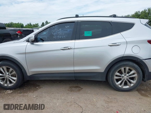 2018 Hyundai Santa Fe 2.0T z VIN 5XYZU4LA9JG537310, wystawiony jako IAAI lot #42393689 z przebiegiem Nie podano mil oraz . Historia ofert i sprzedaży dostępna na DreamBid. Obrazek 14.
