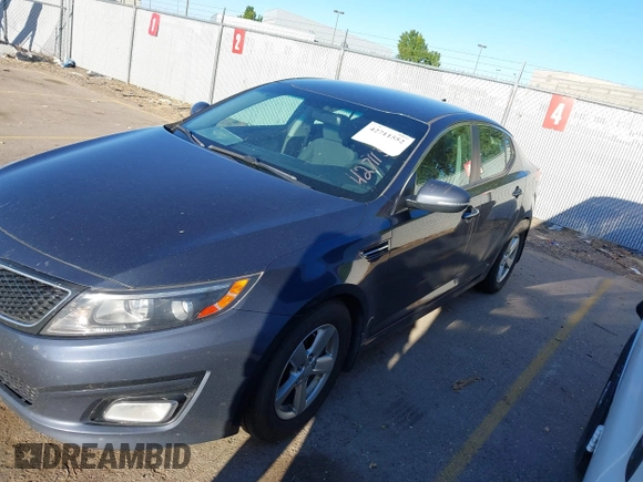 2015 Kia Optima LX with VIN KNAGM4A79F5547332, listed as a IAAI auction lot 42711552 with 154,318 mi miles and . Bid and sale history available at DreamBid. Image 2.