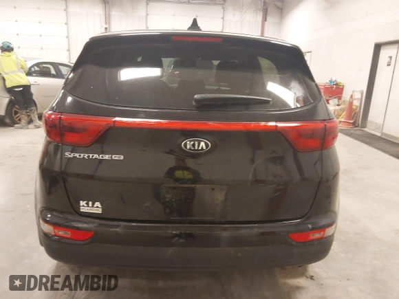 2018 Kia Sportage LX with VIN KNDPM3AC6J7417371, listed as a IAAI auction lot 41879390 with 112,944 mi miles and . Bid and sale history available at carsss.com. Image 16.