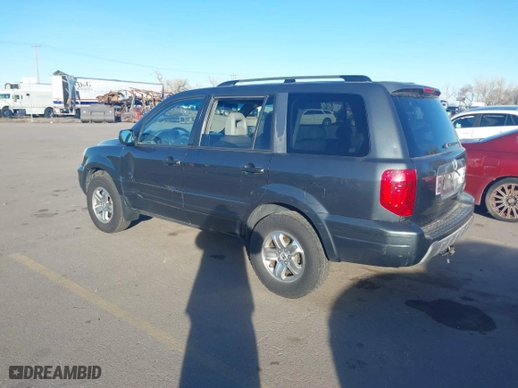 2005 Honda Pilot EX-L with NAVI with VIN 2HKYF18775H553666, listed as a IAAI auction lot 41858179 with 241,011 mi miles. Bid and sale history available at carsss.com. Image 3.