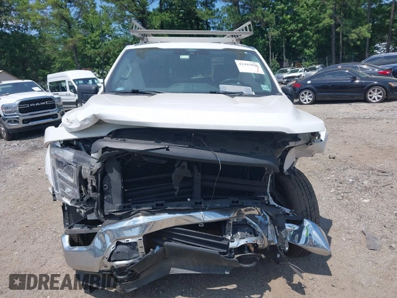 2021 Ford F-150 XL with VIN 1FTMF1E5XMKE21132, listed as a IAAI auction lot 42445898 with 114,014 mi miles and . Bid and sale history available at DreamBid. Image 13.