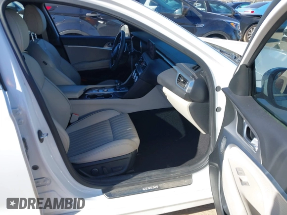 2022 Genesis G70 2.0T with VIN KMTG34TA7NU103998, listed as a IAAI auction lot 41144708 with 88,553 mi miles. Bid and sale history available at carsss.com. Image 5.