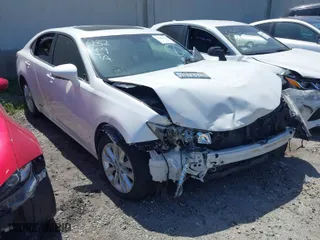 2015 Lexus ES 300h Hybrid with VIN JTHBW1GG2F2092904, listed as a IAAI auction lot 41686129 with NaN miles. Bid and sale history available at carsss.com. Image 1.