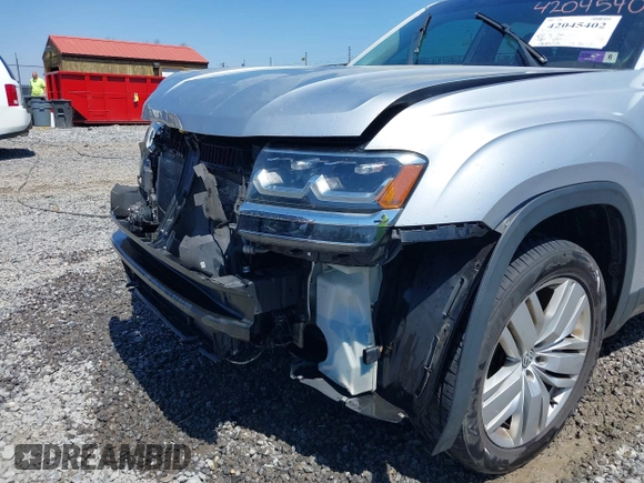 2019 Volkswagen Atlas SE with VIN 1V2UR2CA7KC528108, listed as a IAAI auction lot 42045402 with 66,479 mi miles and . Bid and sale history available at DreamBid. Image 6.