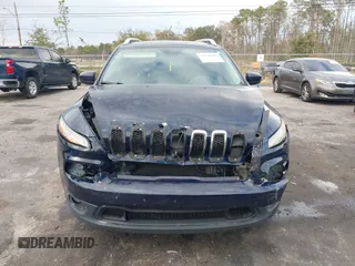2014 Jeep Cherokee Latitude with VIN 1C4PJLCS2EW228418, listed as a IAAI auction lot 41416407 with 154,192 mi miles. Bid and sale history available at carsss.com. Image 12.