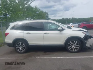2017 Honda Pilot Elite с VIN 5FNYF6H03HB091741, выставлен на аукционе IAAI как лот 42351830 с пробегом 117 005 миль миль и . История ставок и продаж доступна на DreamBid. Изображение 13.