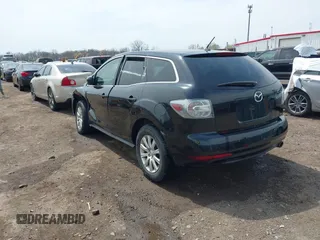 2011 Mazda CX-7 i Sport with VIN JM3ER2B56B0361209, listed as a IAAI auction lot 42013527 with 169,525 mi miles and . Bid and sale history available at DreamBid. Image 3.