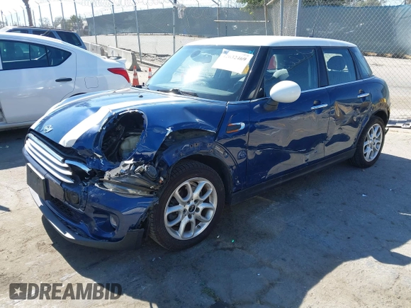 2015 MINI Hardtop 4 Door with VIN WMWXS5C50FT832438, listed as a IAAI auction lot 42632469 with 96,432 mi miles and . Bid and sale history available at DreamBid. Image 2.