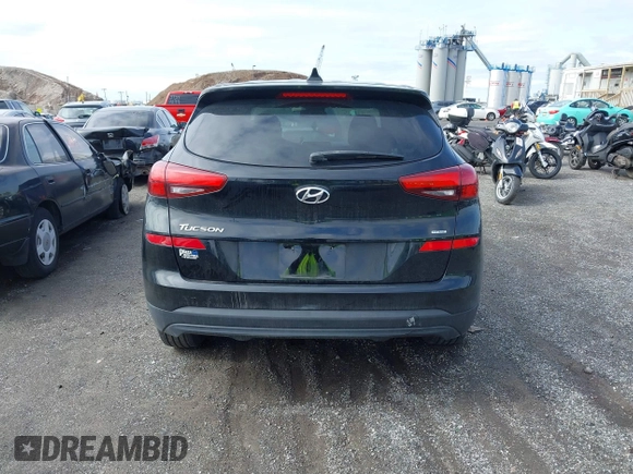 2019 Hyundai Tucson SE with VIN KM8J2CA46KU977863, listed as a IAAI auction lot 41704318 with 23,076 mi miles. Bid and sale history available at carsss.com. Image 16.