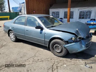 2001 Toyota Camry CE z VIN JT2BG22K410538709, wystawiony jako Copart lot #53295905 z przebiegiem 223 115 mil mil oraz Szkoda całkowita • Salvage title. Historia ofert i sprzedaży dostępna na DreamBid. Obrazek 4.