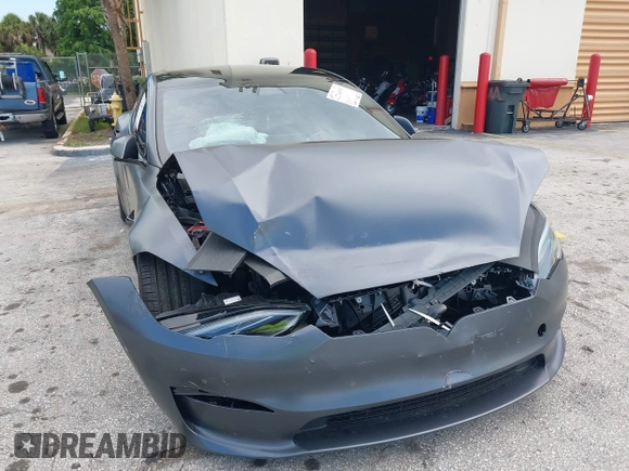 2023 Tesla Model S with VIN 5YJSA1E54PF501565, listed as a IAAI auction lot 42244953 with Not provided miles and . Bid and sale history available at DreamBid. Image 6.